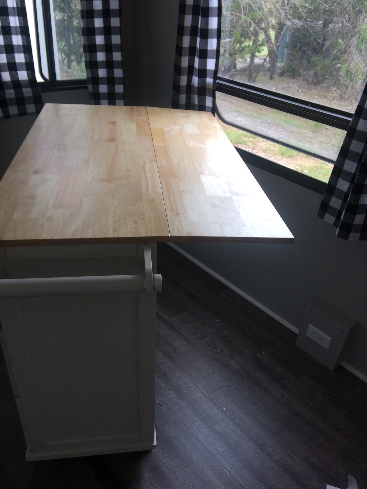 Kitchen island with drop leaf extended