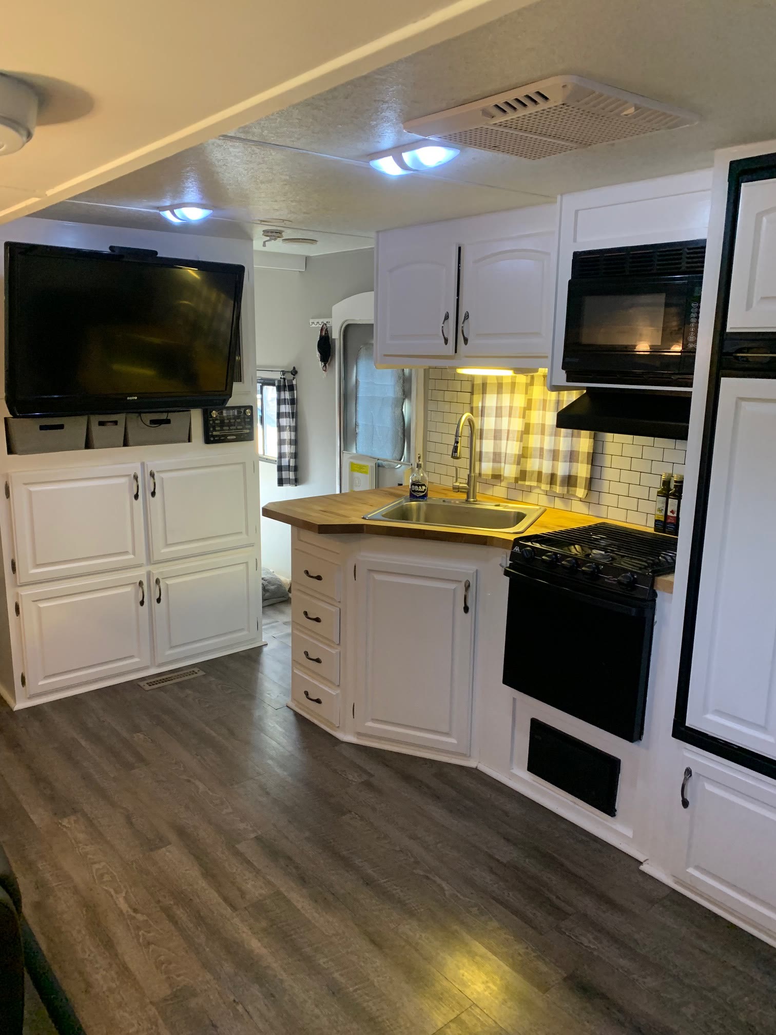Open living room and kitchen with vinyl plank flooring