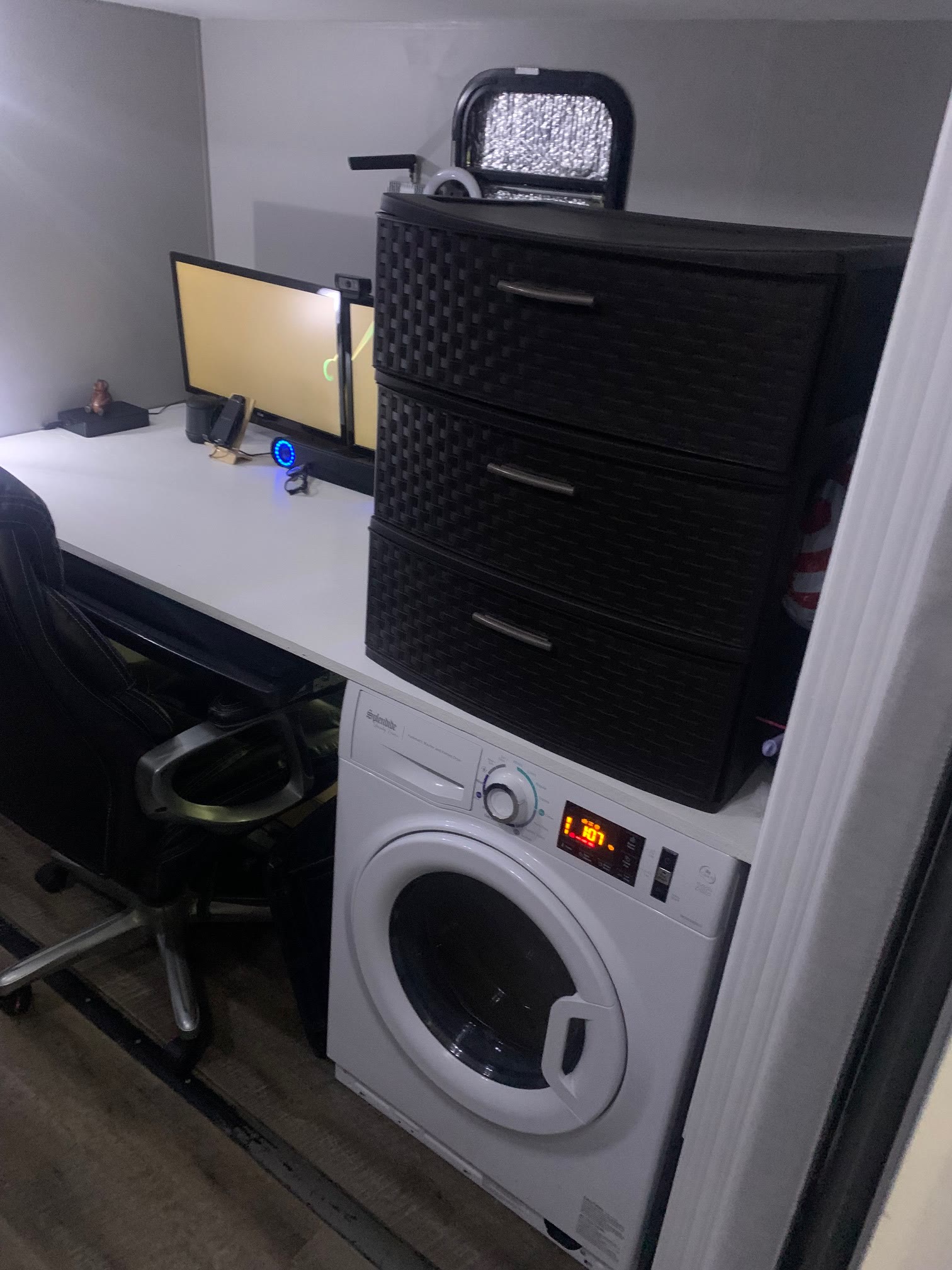 All-in-one washer dryer under the office desk
